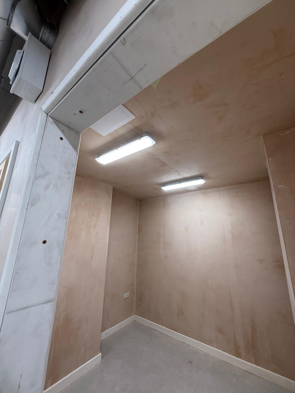 Commercial room with newly installed lighting